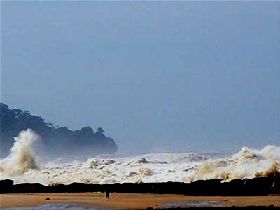 The tsunami hits the shore - Photo by John Knill and Jackie Knill