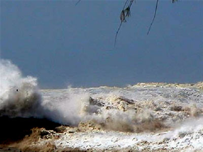 The tsunami covers the beach - Photo by John Knill and Jackie Knill