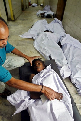 A young girl is covered in the morgue